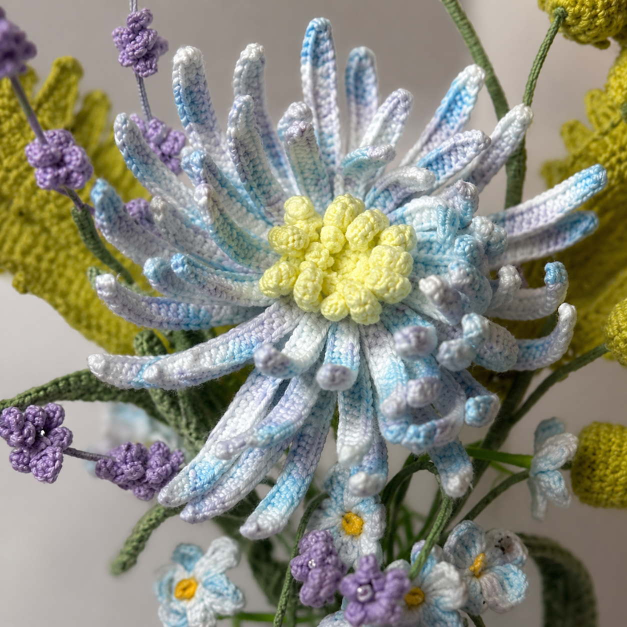 Hand-knitted blue chrysanthemum bouquet placed in a smiling ceramic vase | Home decoration arrangement | Table centerpiece decoration gift