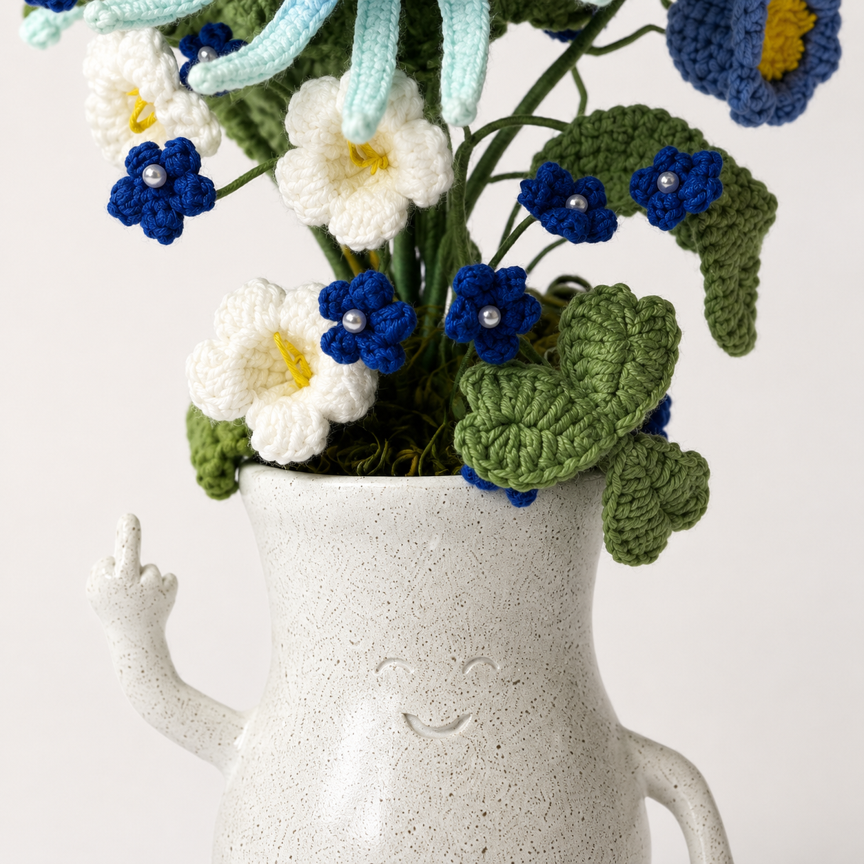 Hand-knitted blue chrysanthemum bouquet placed in a smiling resin givin-you-the-bird vase |Funny Flower Home Decoration | Knitted Table Center Decoration Gift